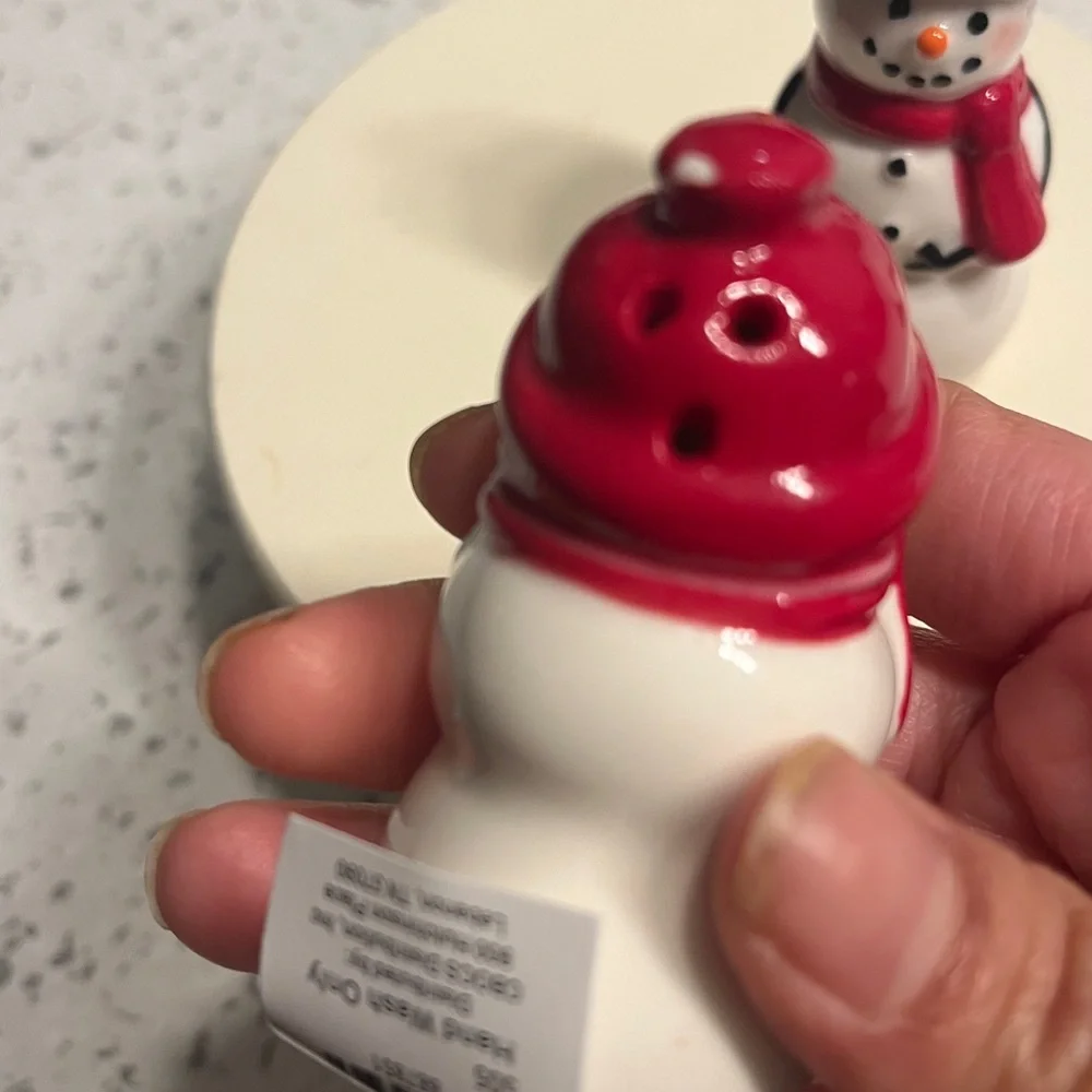 Ceramic Snowman Figurines with Red and Black Accents